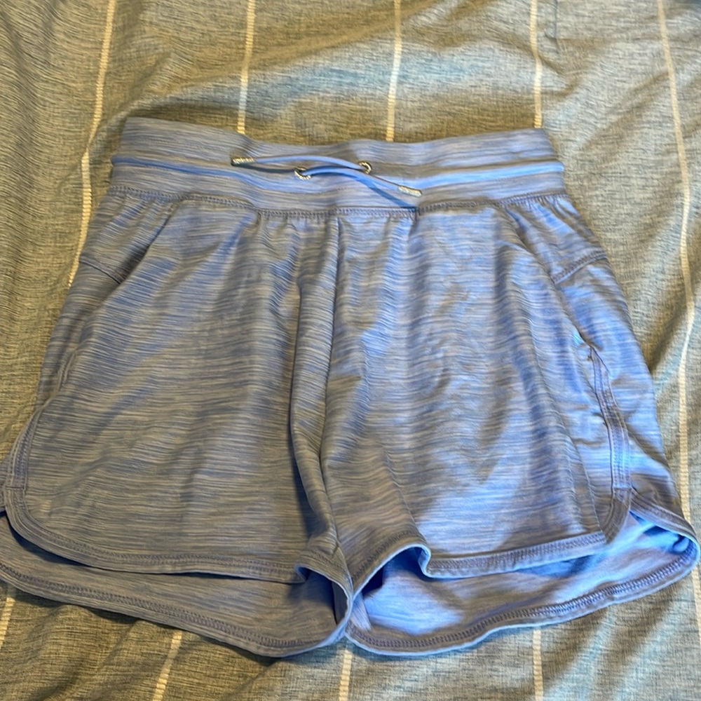 All in motion blue running shorts. Size L in girls